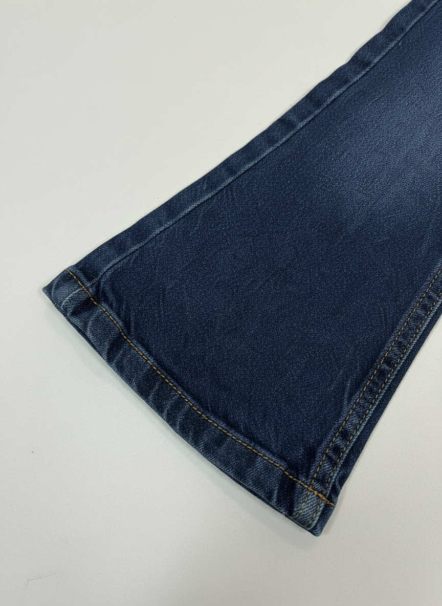 Close-up detail shot of hem and ankle area