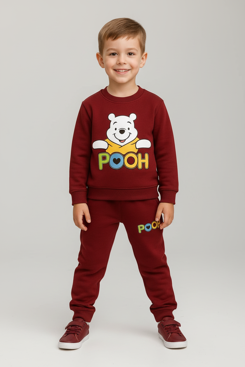 Professional studio product image of child wearing burgundy Winnie the Pooh tracksuit